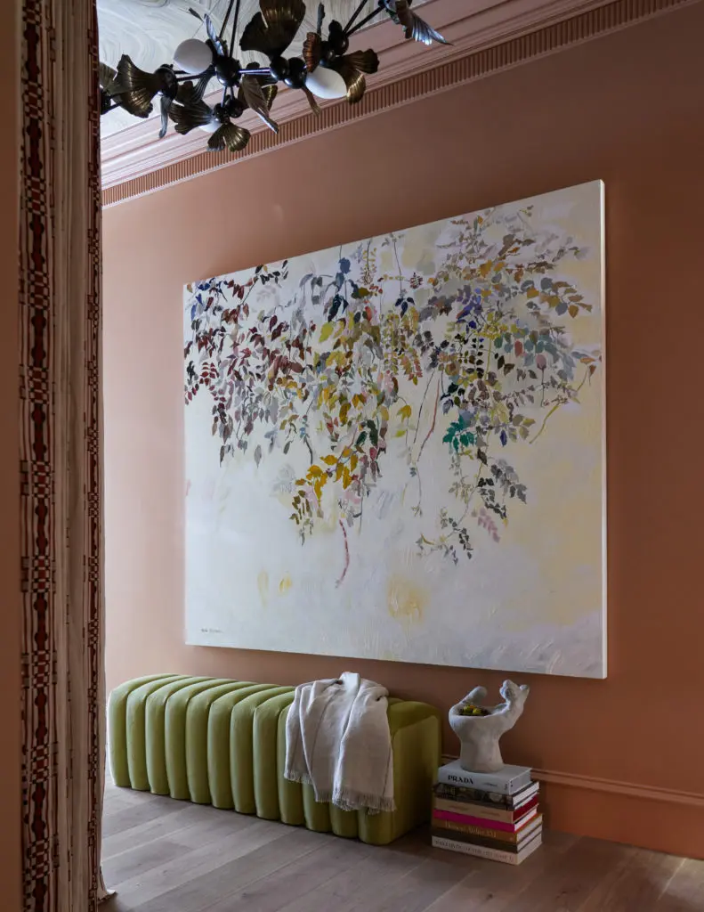  Atelier Davis evokes the Texas sunset with a palette of warm rusts and pops of green in the Vestibule and Powder Room. (Photo by Nathan Schroeder)
