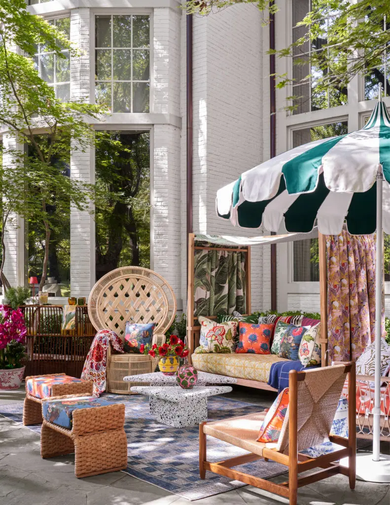 Saturated colors and vivid patterns in this Outdoor Terrace by Isabel Ladd Interiors play together like a Brazilian carnival — loud, vibrant, and unapologetic. (Photo by Nathan Schroder)