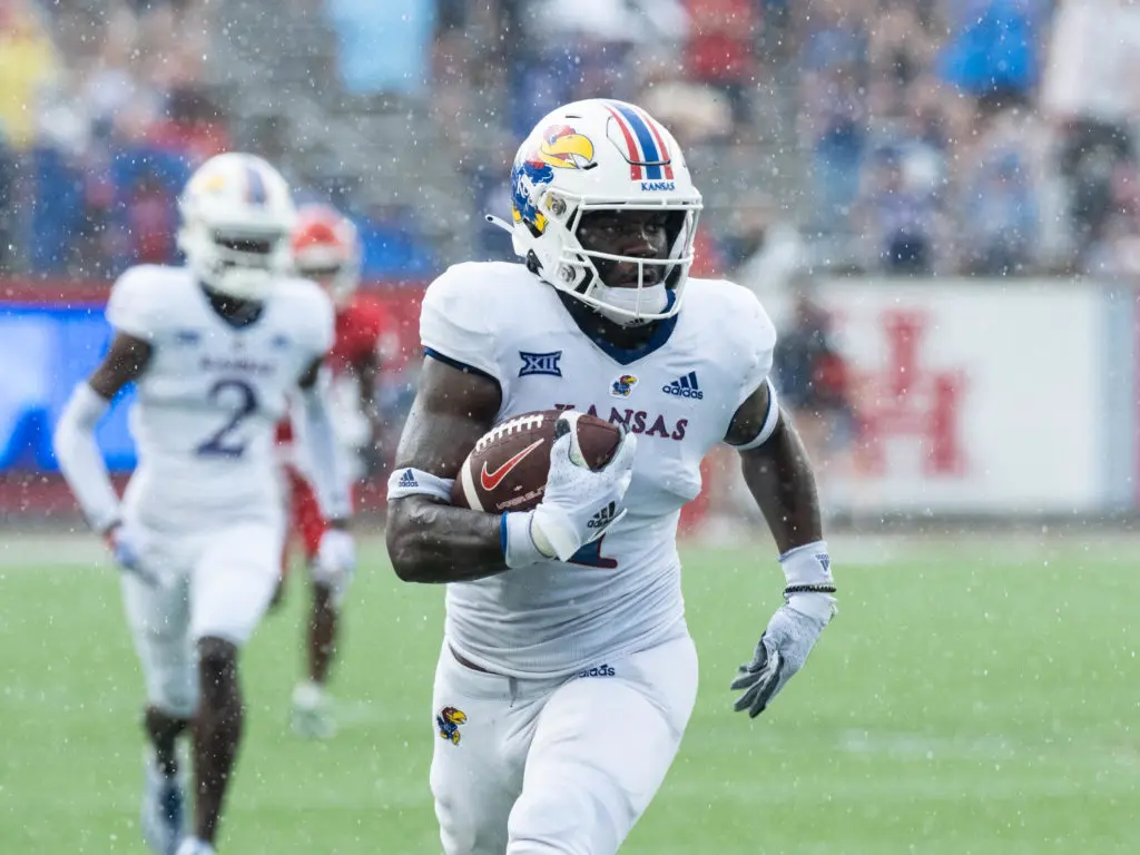 Kansas found running easy against Houston, averaging 6.5 yards per rush. (Photo by F. Carter Smith)
