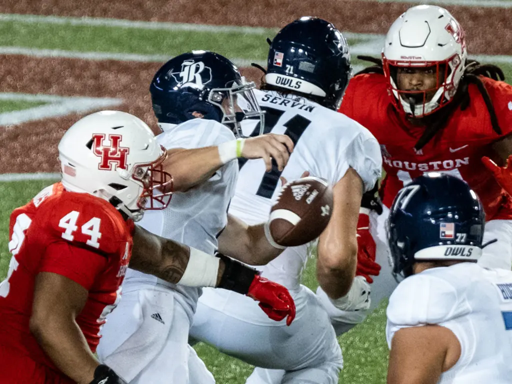 Rice defensive lineman D'Anthony Jones forced the fumble from Rice quarterback TJ McMahon that turned the game.  (Photo by F. Carter Smith)