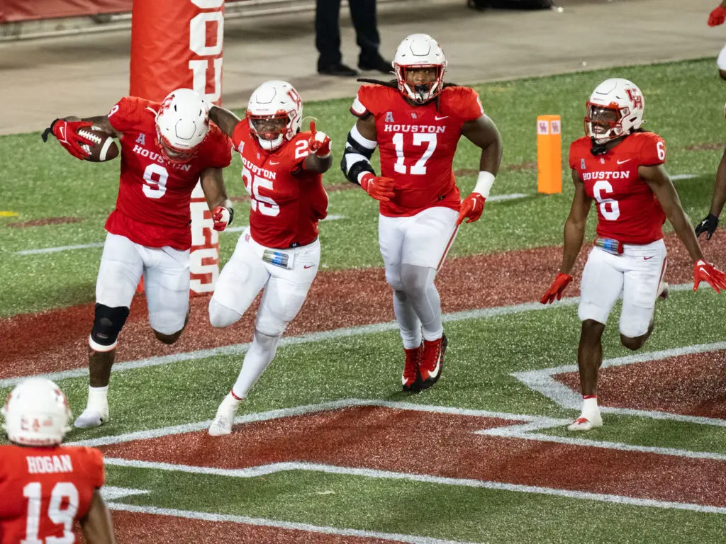 Nelson Ceaser scooped up the fumble from Rice quarterback TJ McMahon and turned it into a touchdown.  (Photo by F. Carter Smith)