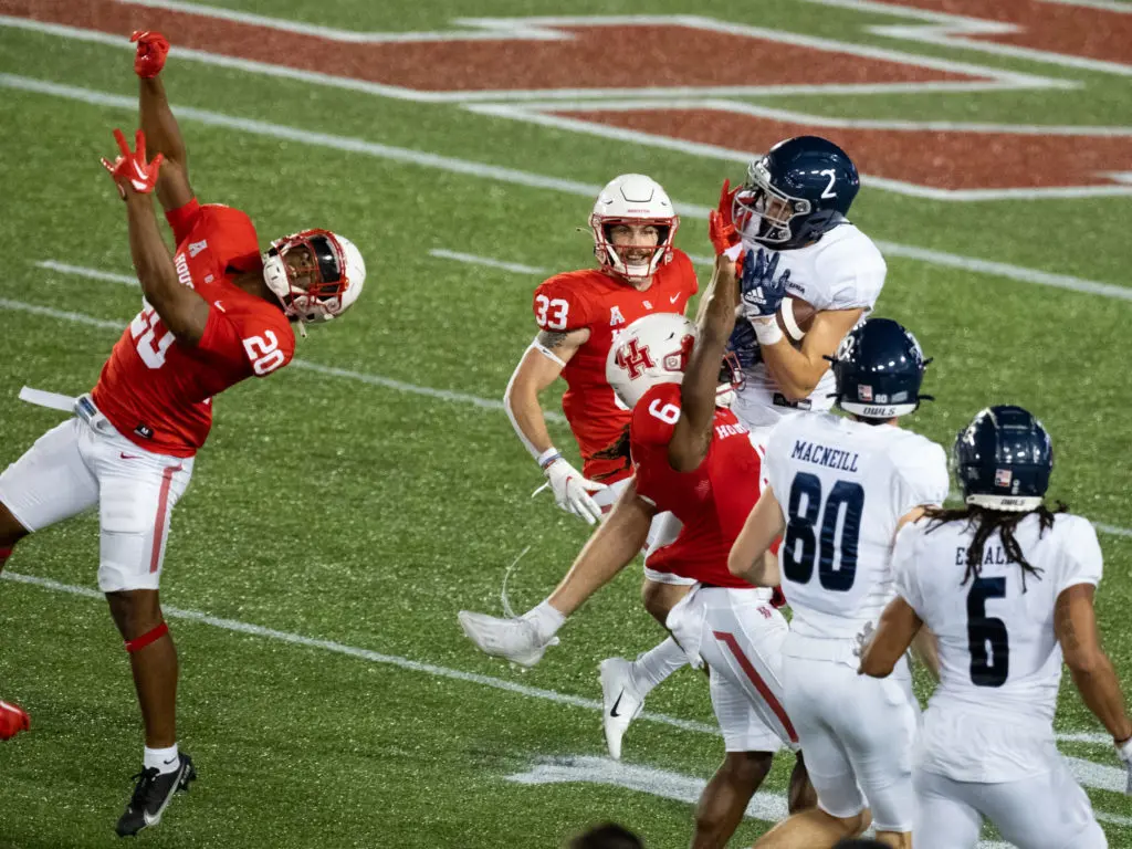 Rice's Hail Mary was answered when Bradley Rozner somehow came down with a 51-yard pass and one second was put back on the clock.  (Photo by F. Carter Smith)