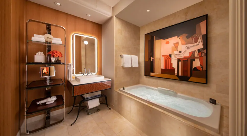 A reconfiguration to the washroom has introduced separate vanities and doubled the storage space. (courtesy of Wynn Las Vegas)