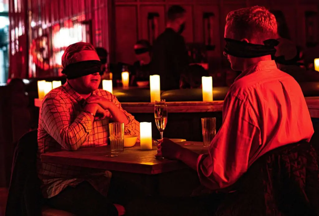 Dining in the dark events are cropping up all over the country. (Photo by Ralph Smith)