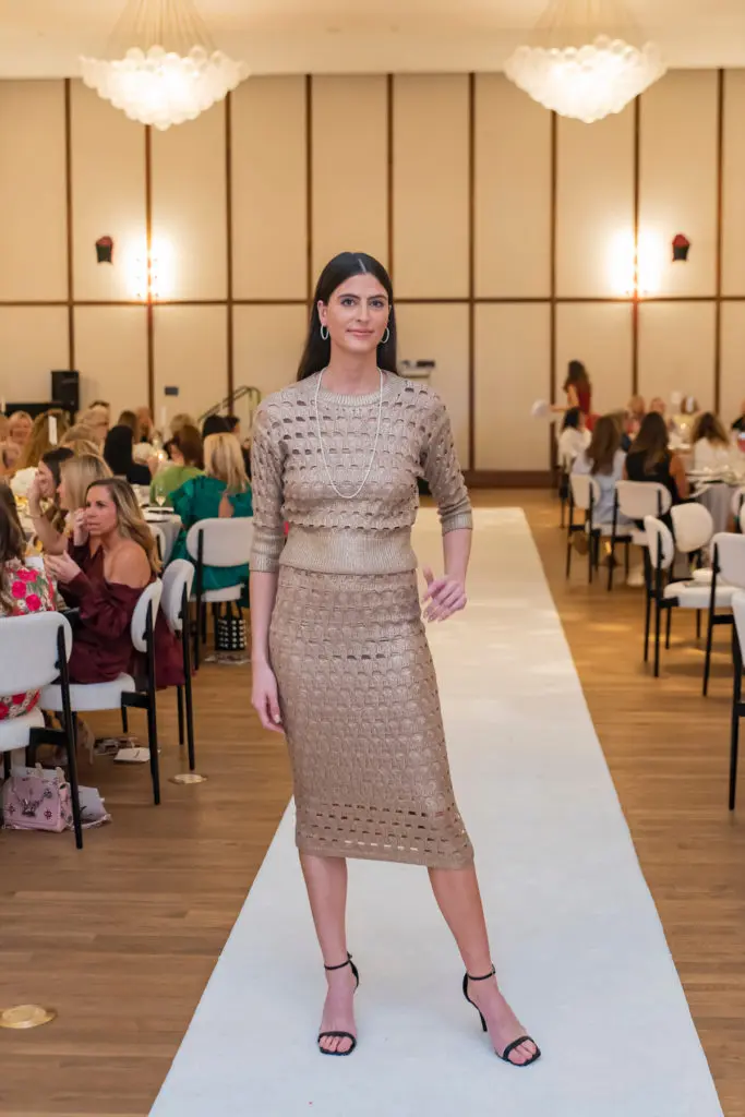 A runway model wearing St. John. (Photo by Tamytha Cameron Photography)