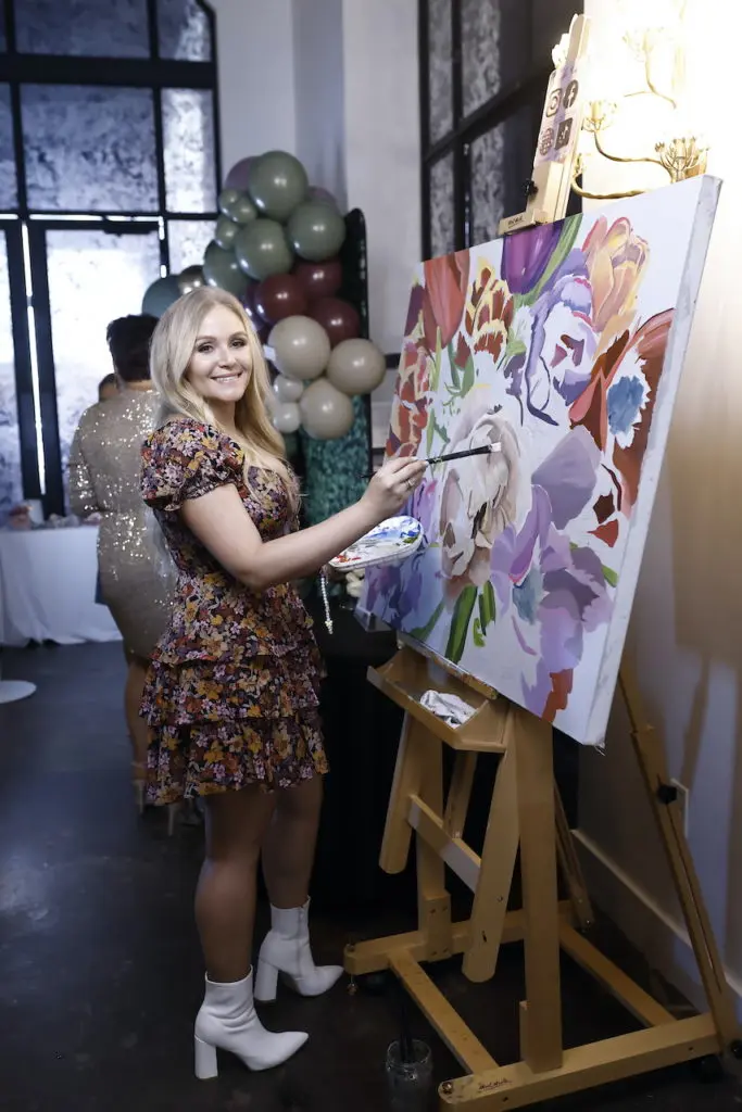 Artist Tyler Kay at the Houston Ladies Who Brunch fundraiser at The Revaire