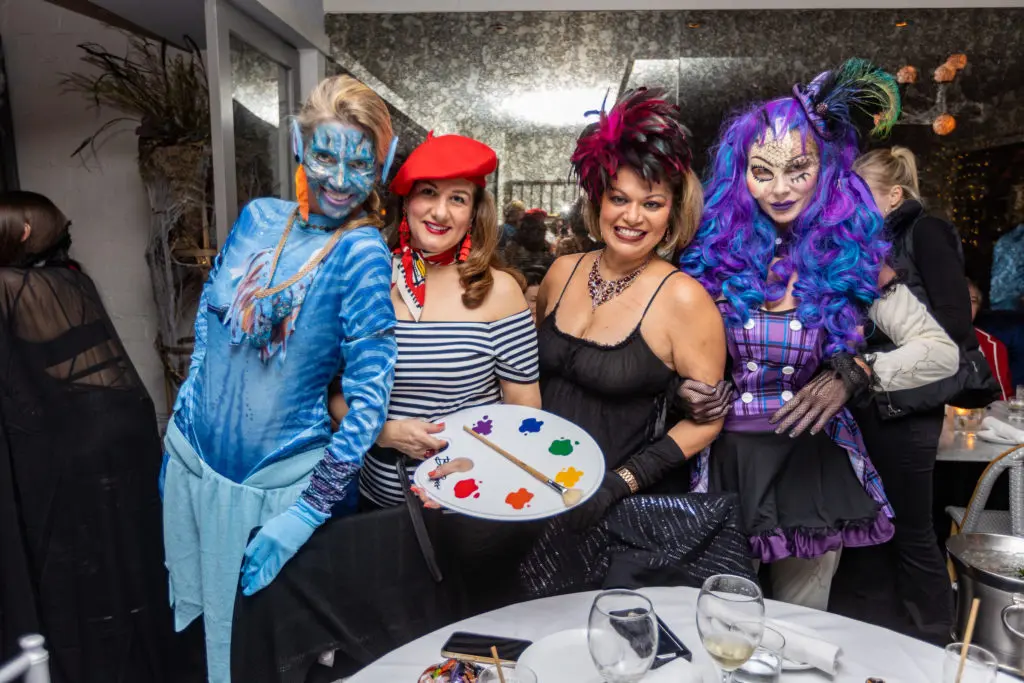 Happy costumed revelers at Brasserie 19's annual Halloween Bash.  (Photo by Andrew Hemingway)