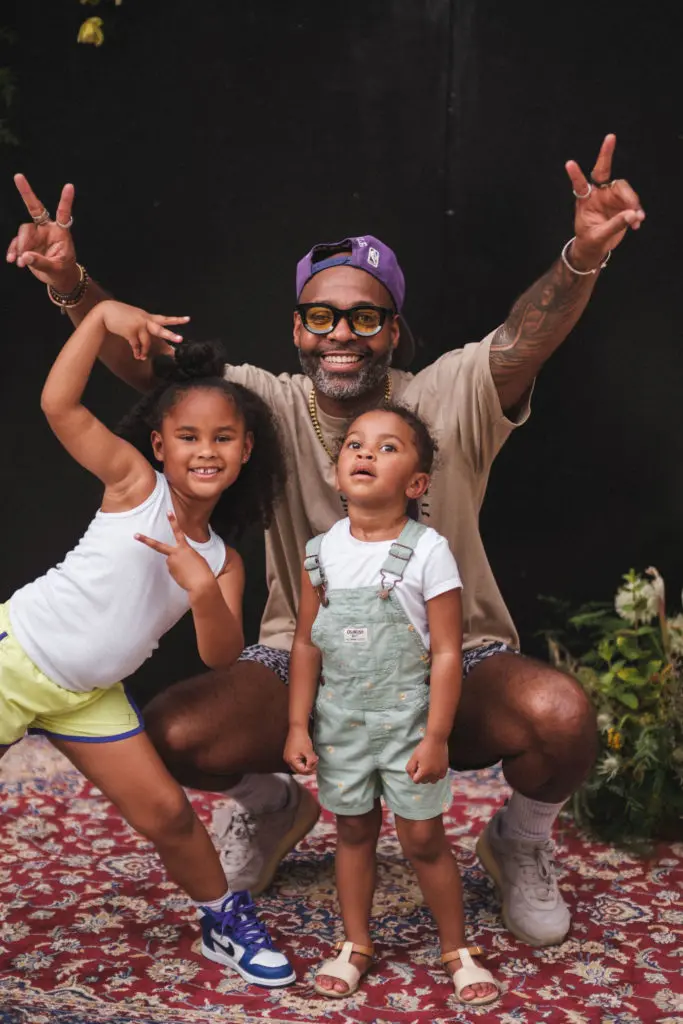 CoolxDad founder Kevin Barnett, shown here with his daughters, knows winning prizes helps spread the word.