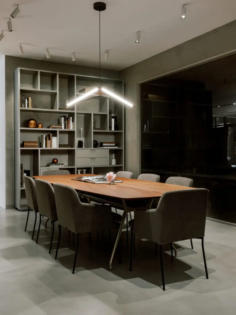 Bold hues and clean lines with the Rimadesio Opus Bookcase and Manta Dining Table. (Photo by Divya Pande)