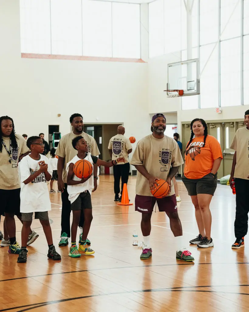 Fathers enjoy playing basketball with their children at CoolxDad's Father + Child Clinic. (Courtesy Kevin Barnett)