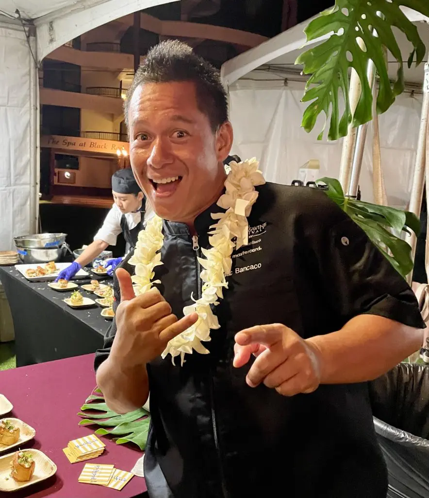 Maui's own chef Isaac Bancaco serves up buttermilk lobster rolls at Hawaii Food and Wine Festival's kick-off event. Photo by Courtney Dabney.