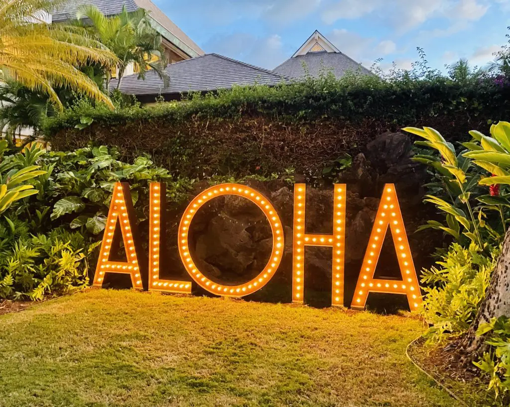 The classic Hawaiian greeting at the entrance to the Hawaii Food & Wine Festival's launch event on the island of Maui. Photo by Courtney Dabney.