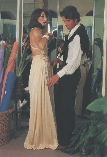 Anjelica Huston being fitted in a Halston evening dress, 1970s (From the book "Halston" from Phaidon) 