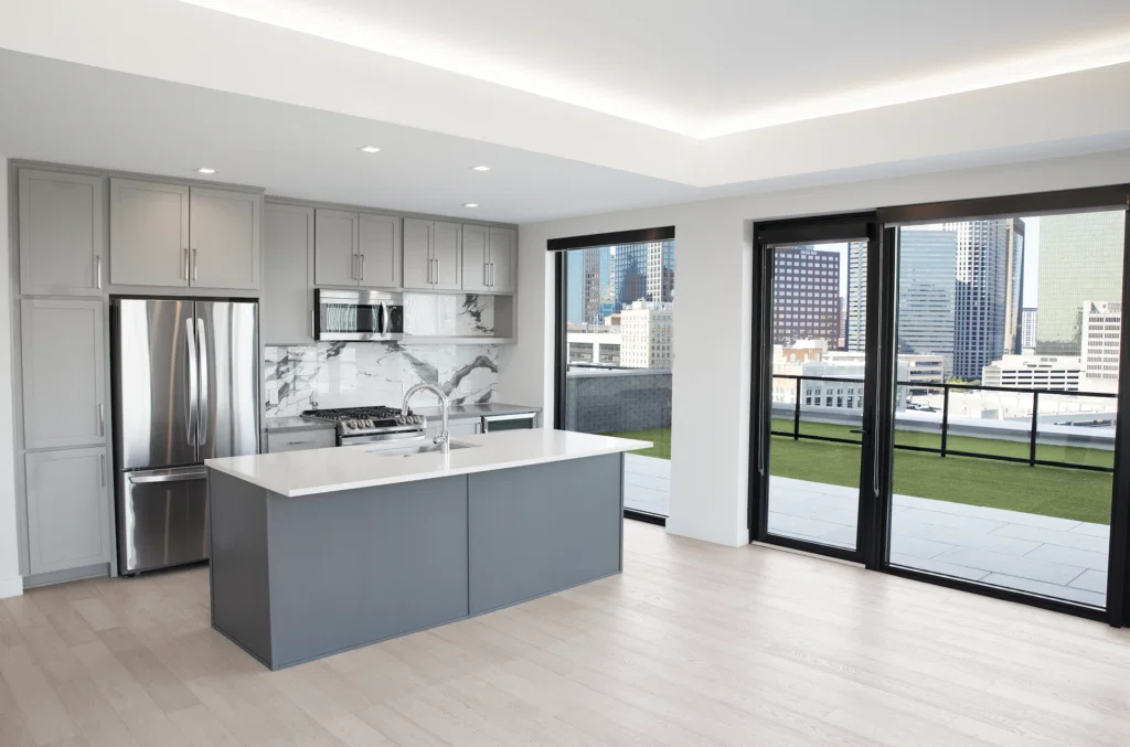 Each floor in the tower alternates between a dark, quartz gray aesthetic and a sleek white aesthetic.