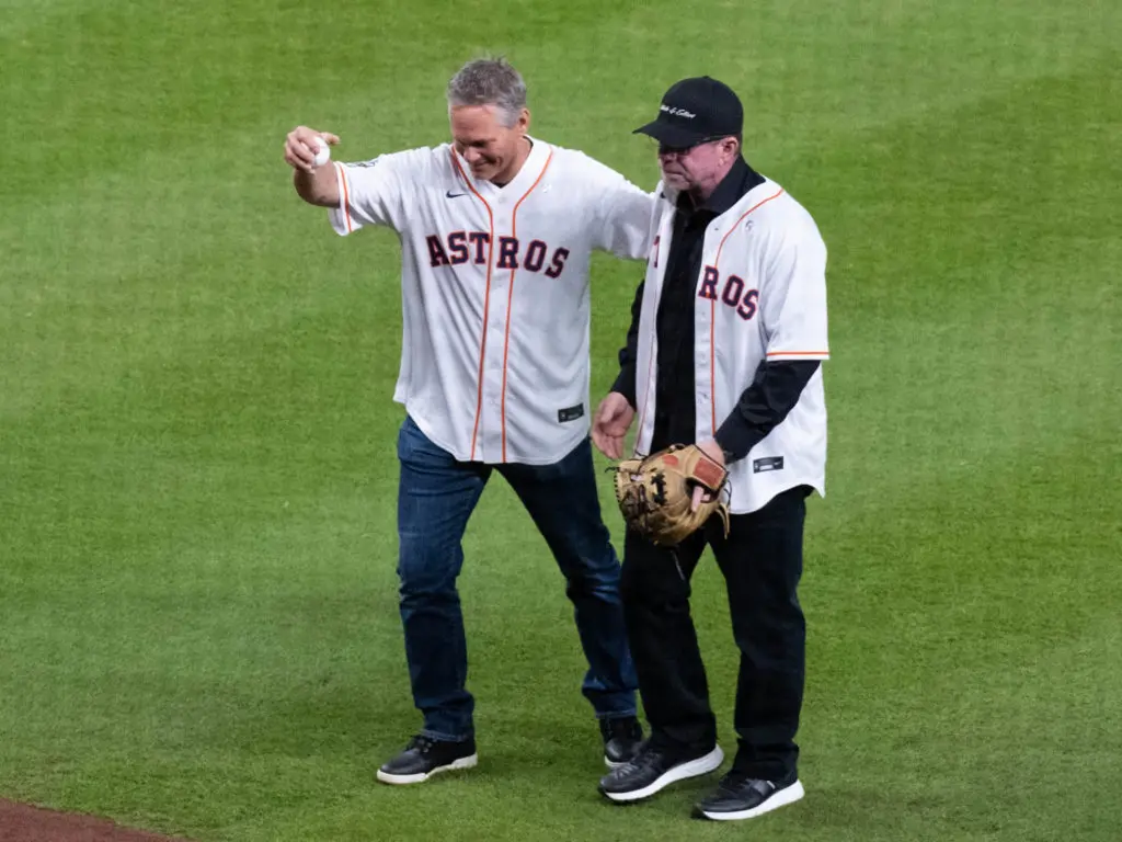 Houston Astros greats Craig Biggio and Jeff Bagwell came together to throw out the first pitch before Game 2 of the 2022 World Series.  (Photo by F. Carter Smith)