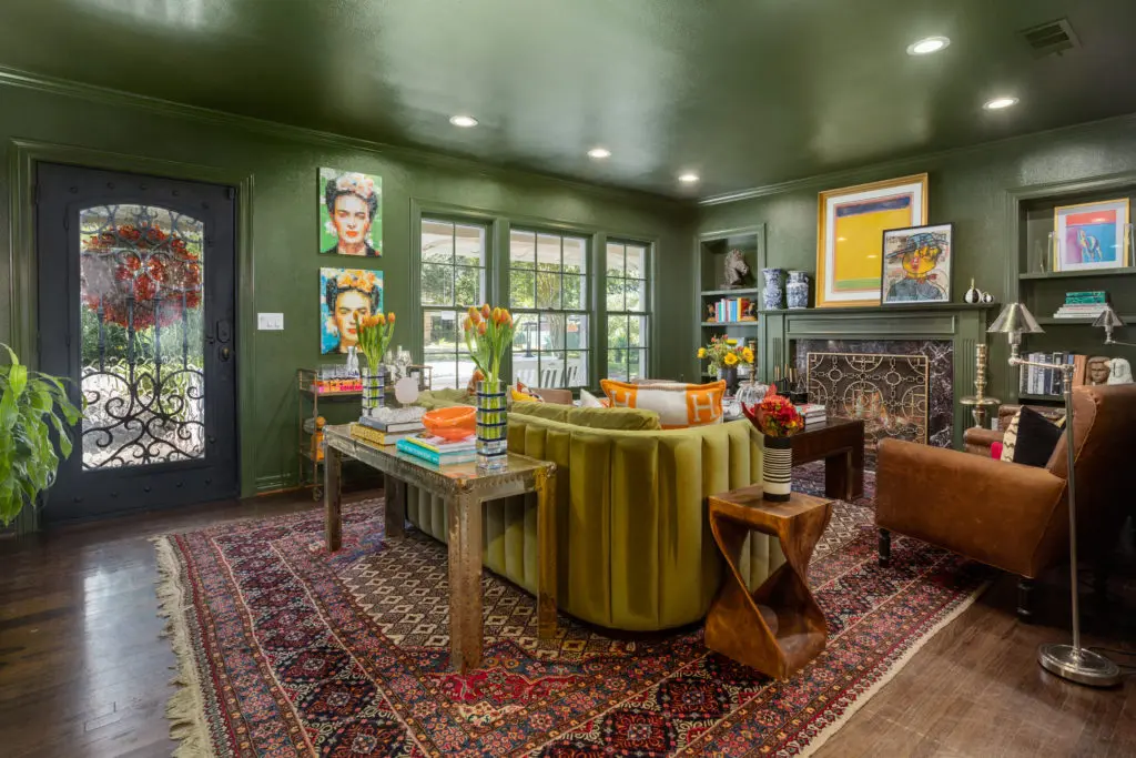 104 Crestwood brings a formal living with lush fern green from trim to ceiling.