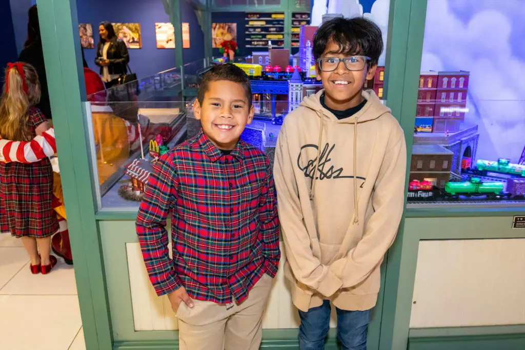 Vasco Castaneda and friend at the 2022 Trains at NorthPark. (Photo by Bret Redman)