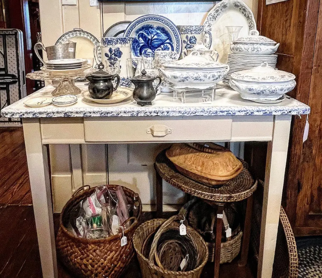 China and vintage baskets. (Photo by Dallas Estate Sellers)