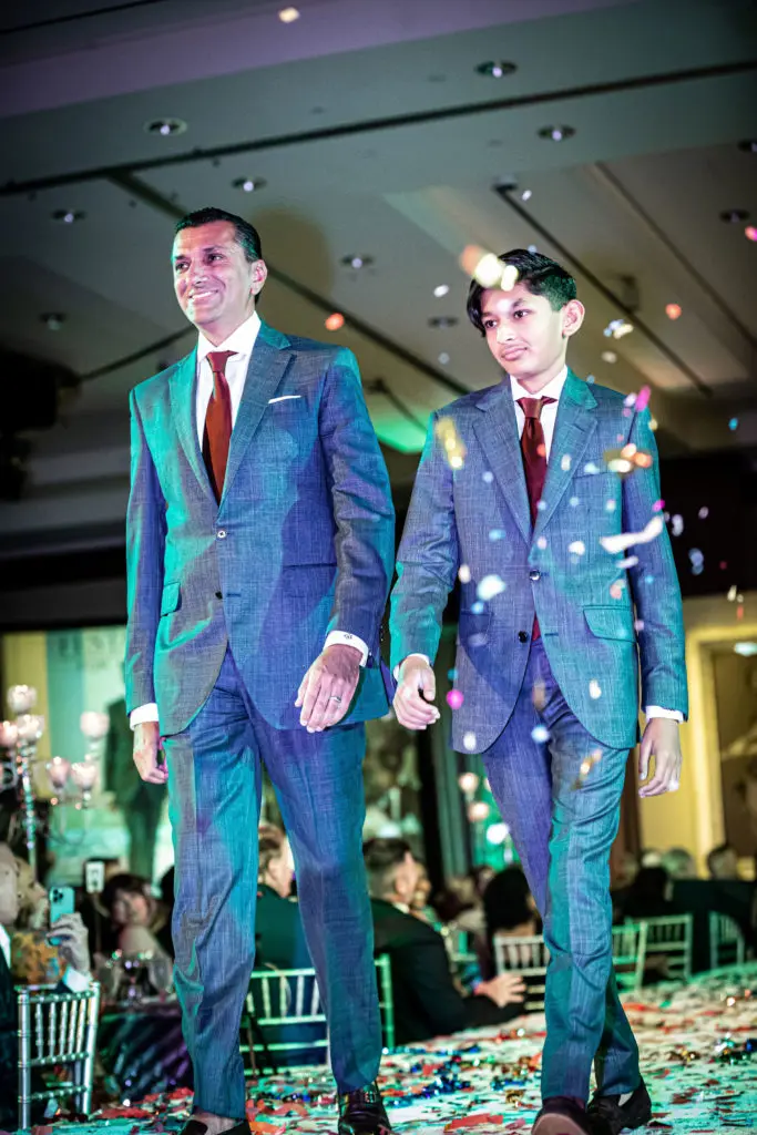 Ajay Khurana and son Shaan Khurana on the catwalk at Una Notte in Italia (Photo by Steven Taylor)