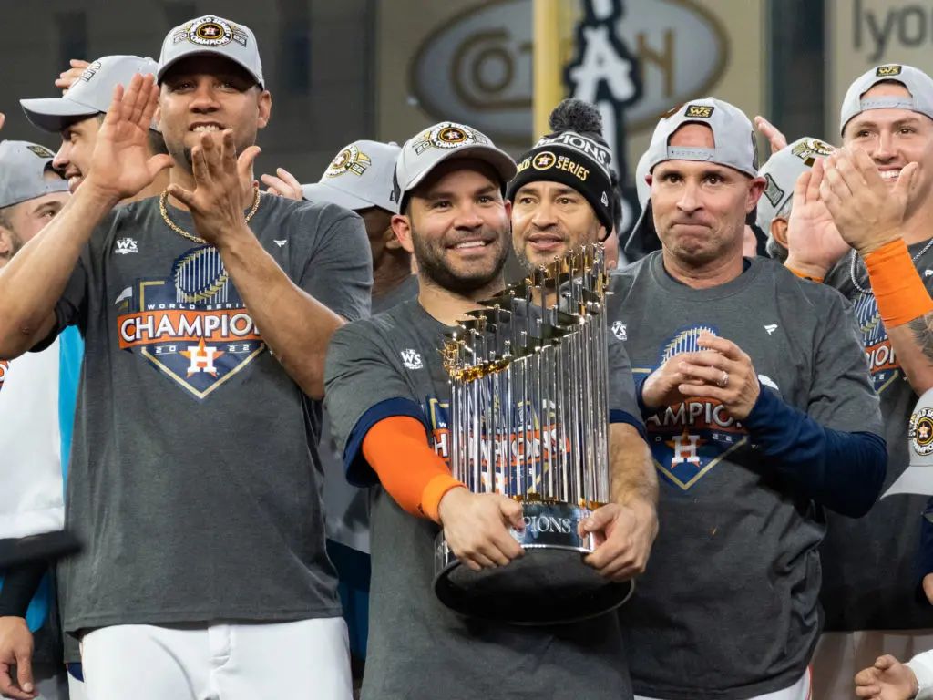 Astros star Jose Altuve seemed like he never wanted to let go of that trophy. (Photo by F. Carter Smith)
