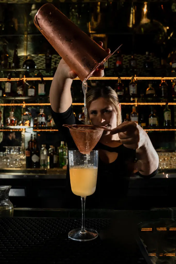Julep's Alba Huerto created the cocktail menu for Emilia's Havana. Here the bartender prepares an El Presidente. (Photo by Brian Kennedy)