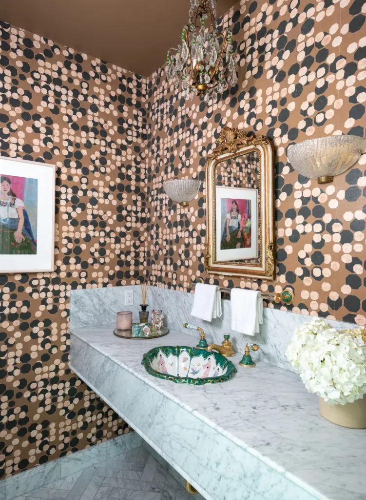 Wilson chose a bold Kelly Wearstler wallpaper for the power room. Photo by Michael Hunter.
