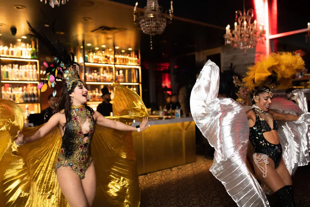 An exotic dance group performs at the Flora Cena Negra. (Photo by Leah Walker Wilson)