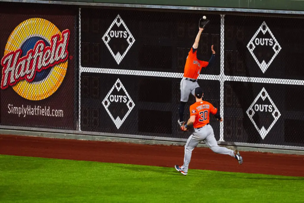 Chas McCormick went up high — and used every bit of his old high school basketball skills — to make one of the great catches in World Series history for the Astros. (@Astros)