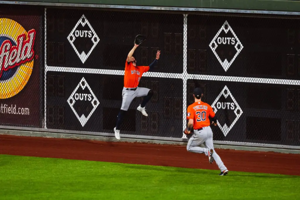 Chas McCormick went up high — and used every bit of his old high school basketball skills — to make one of the great catches in World Series history for the Astros. (@Astros)