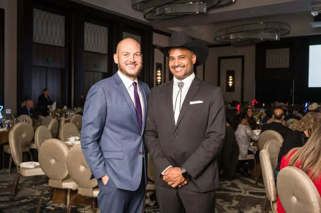 Nick Nagurski, Alvin Abraham at the 'Grand Champion for TEACH' fundraiser. (Photo by Daniel Ortiz)