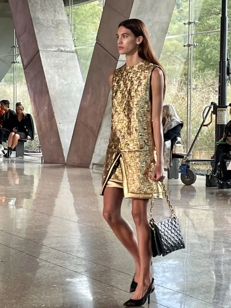 Embossed gold dress, paired with embossed handbag. Photo by Courtney Dabney.