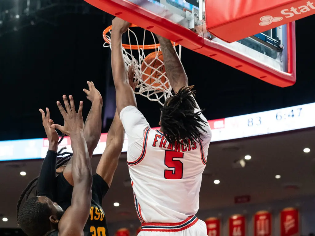 UH forward Ja'Vier Francis can throw down some thunderous dunks, (Photo by F. Carter Smith)