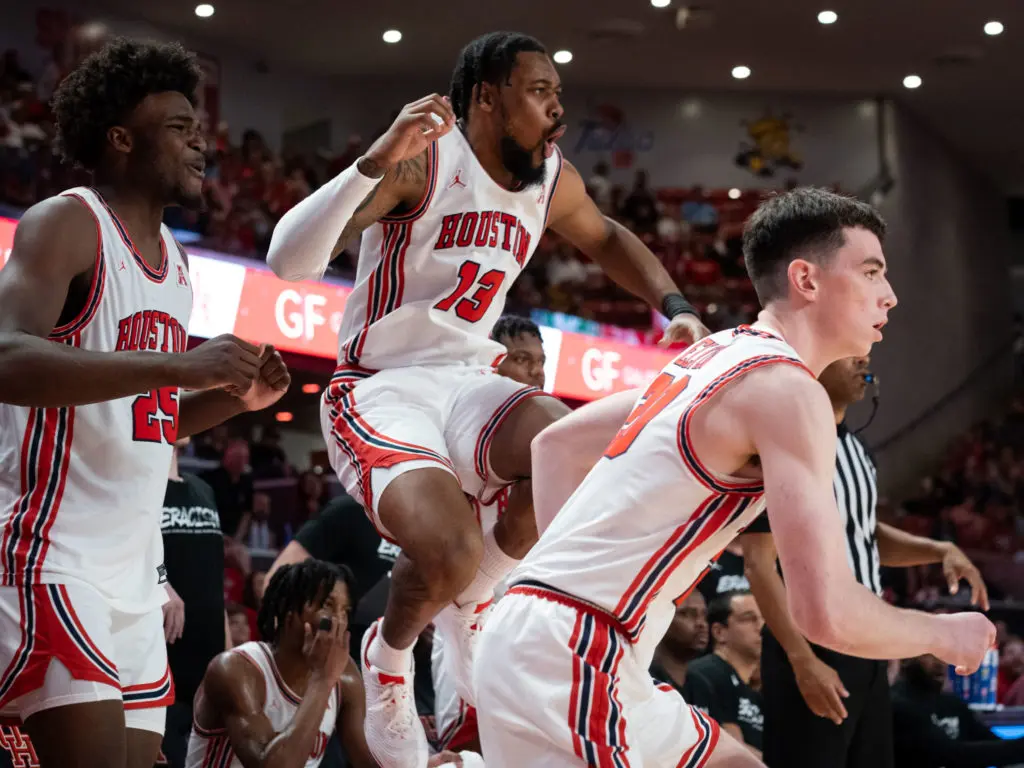 UH forwards Jarace Walker and J'Wan Roberts are pumped to see teammates like Ryan Elvin succeed too. (Photo by F. Carter Smith)
