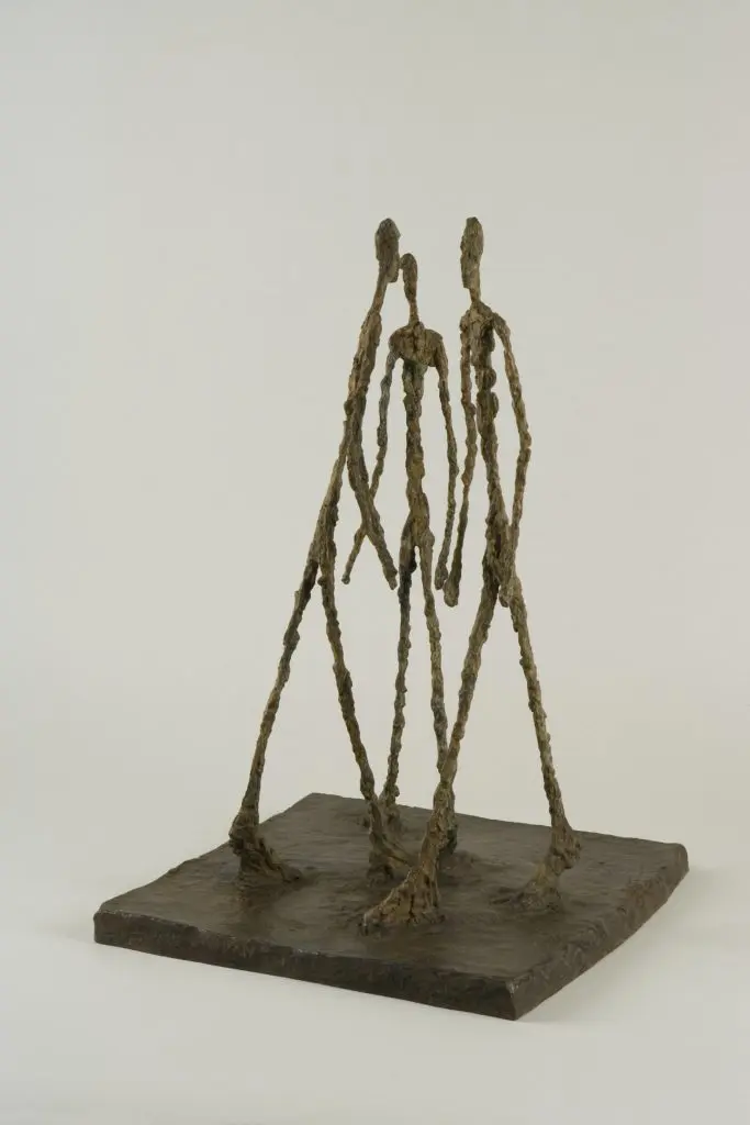 Alberto Giacometti, Three Men Walking, c. 1948, bronze, Fondation Giacometti. Succession Alberto Giacometti/ADAGP, Paris, 2022.