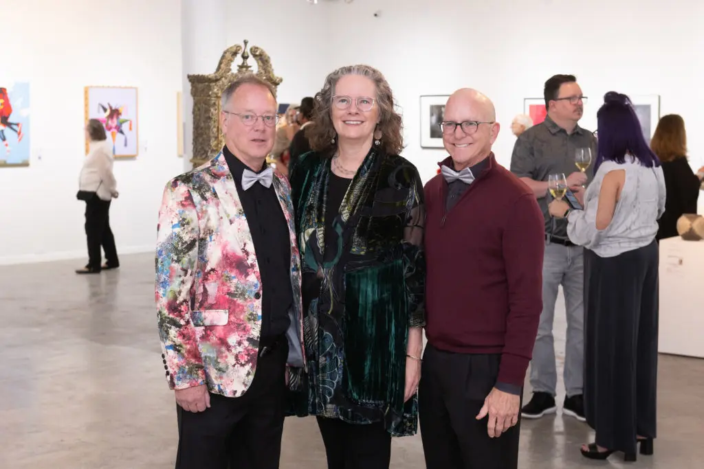 Art on the Avenue founding member Mark Parthie, Avenue CEO Mary Lawler, founding member Judge Steven Kirkland at the 25th anniversary event held at Winter Street Studios (Photo by Wilson Parish)