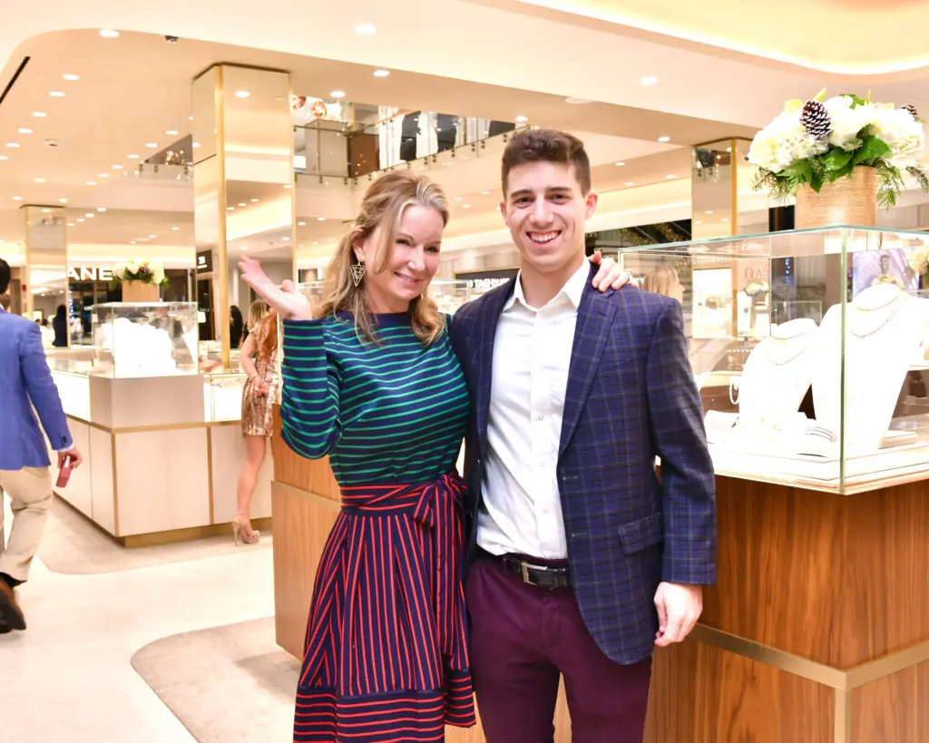 Joann Philpott and son Henry Philpott at the Zadok Jewelers holiday party (Photo by Alex Montoya)