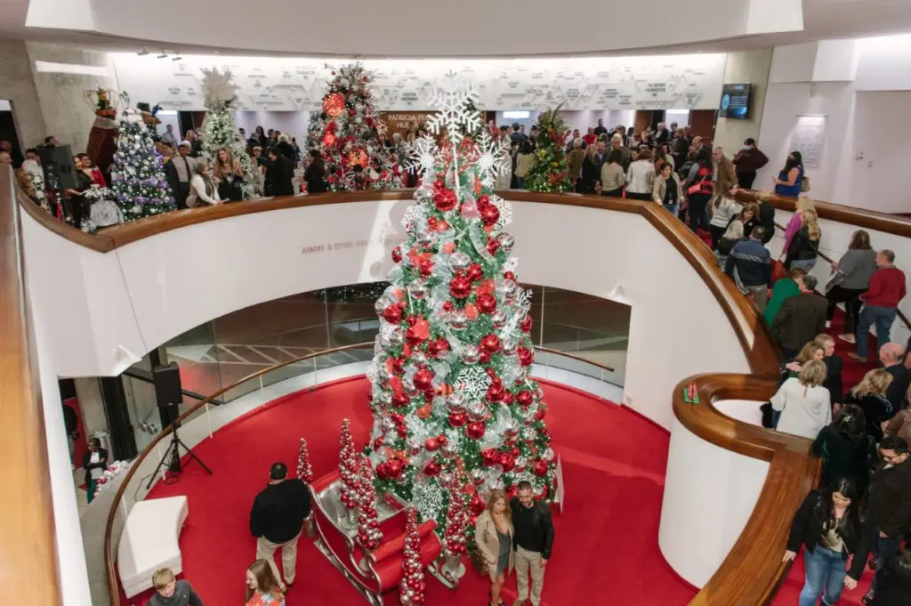 13 Festive Trees, a $3 Million Scrooge and Theatre Magic Make the Alley a Houston Holiday Wonderland
