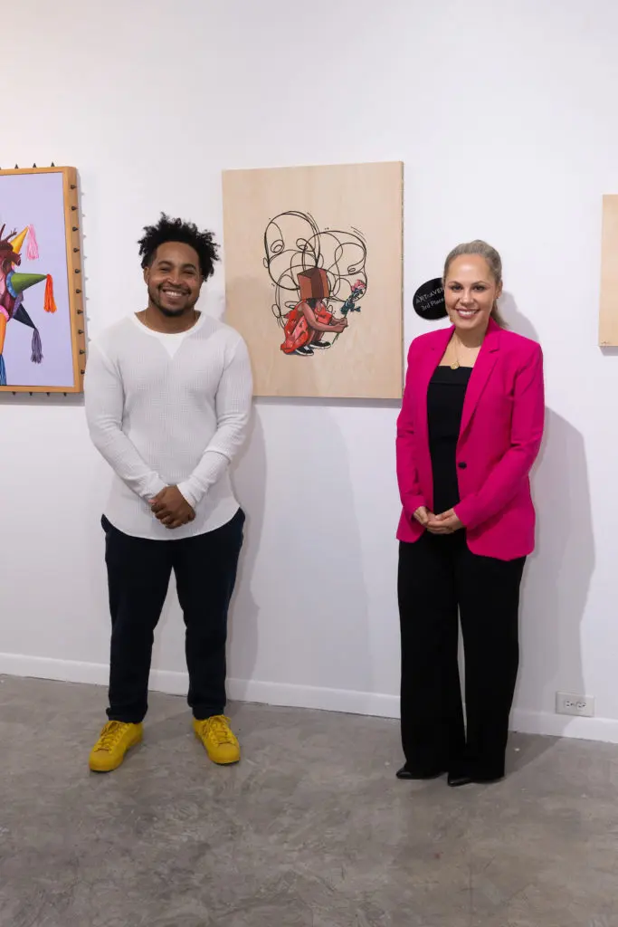 Third Prize Winner Dominique Silva, Guest Juror Danielle Burns Wilson at the 25th Art on the Avenue anniversary event (Photo by Wilson Parish)
