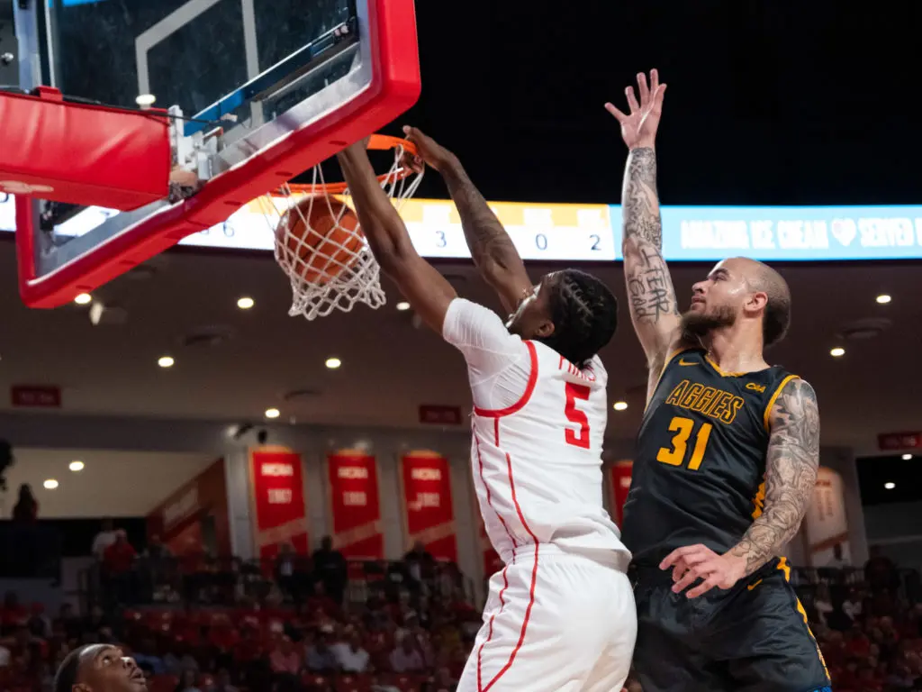 UH center Ja'Vier Francis is a dunk machine. (Photo by F. Carter Smith)