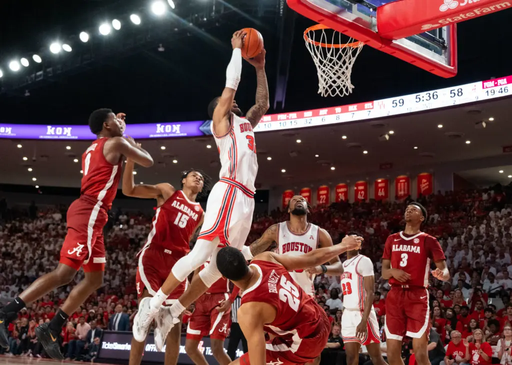 UH forward Reggie Chaney is capable of throwing down a big dunk. (Photo by F. Carter Smith)
