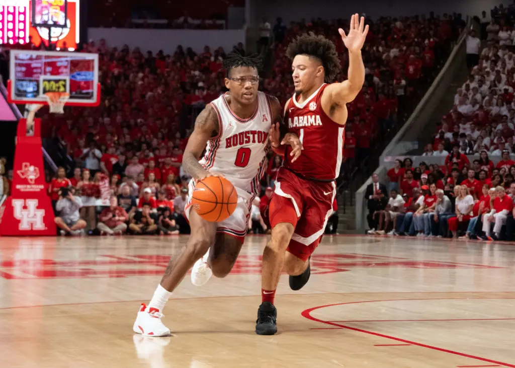 UH guard Marcis Sasser found the going tough against Alabama's defense. (Photo by F. Carter Smith)