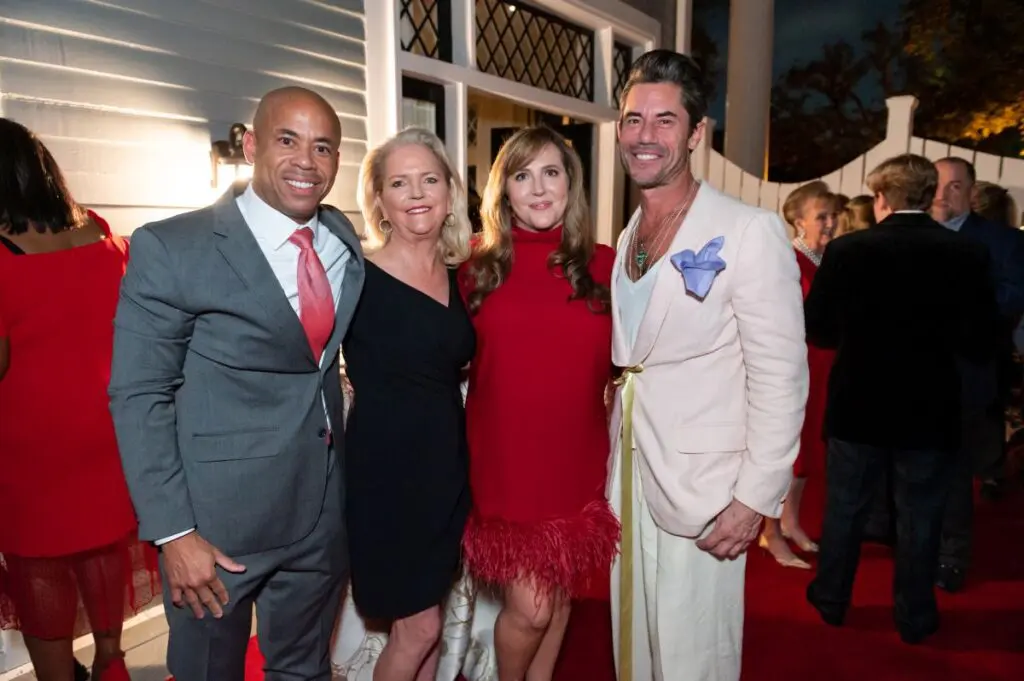 Dr. Robert Hilliard Jr., Chree Boydstun, Mary Patton, Milton Townsend at Legacy Community Health's Holiday Schmooze at Townsend's Montrose home. (Photo by Killy Chavez)