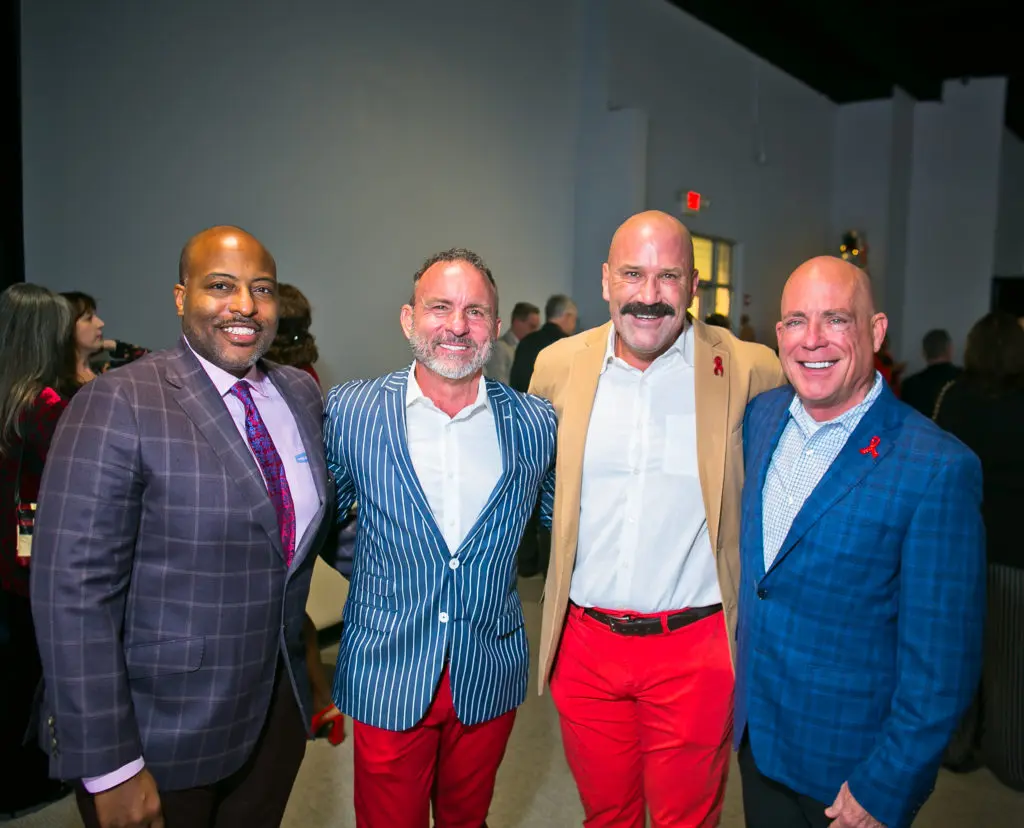 Kyle Pierce, Joe Kaye, Lyndsey Linnen, Chris Lewis at the AIDS Foundation Houston World AIDS Day luncheon. (Photo by Morris Malakoff)