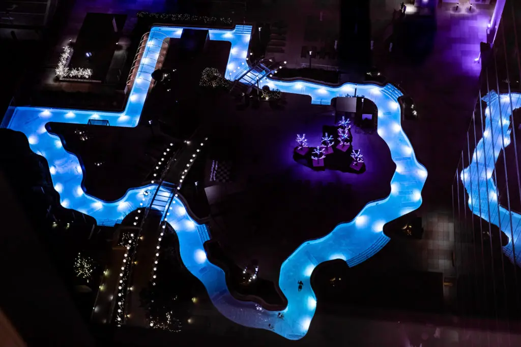 A float-under-the-lights experience can be enjoyed at the Texas-shaped lazy river at Marriott Marquis' Texas Winter Lights.