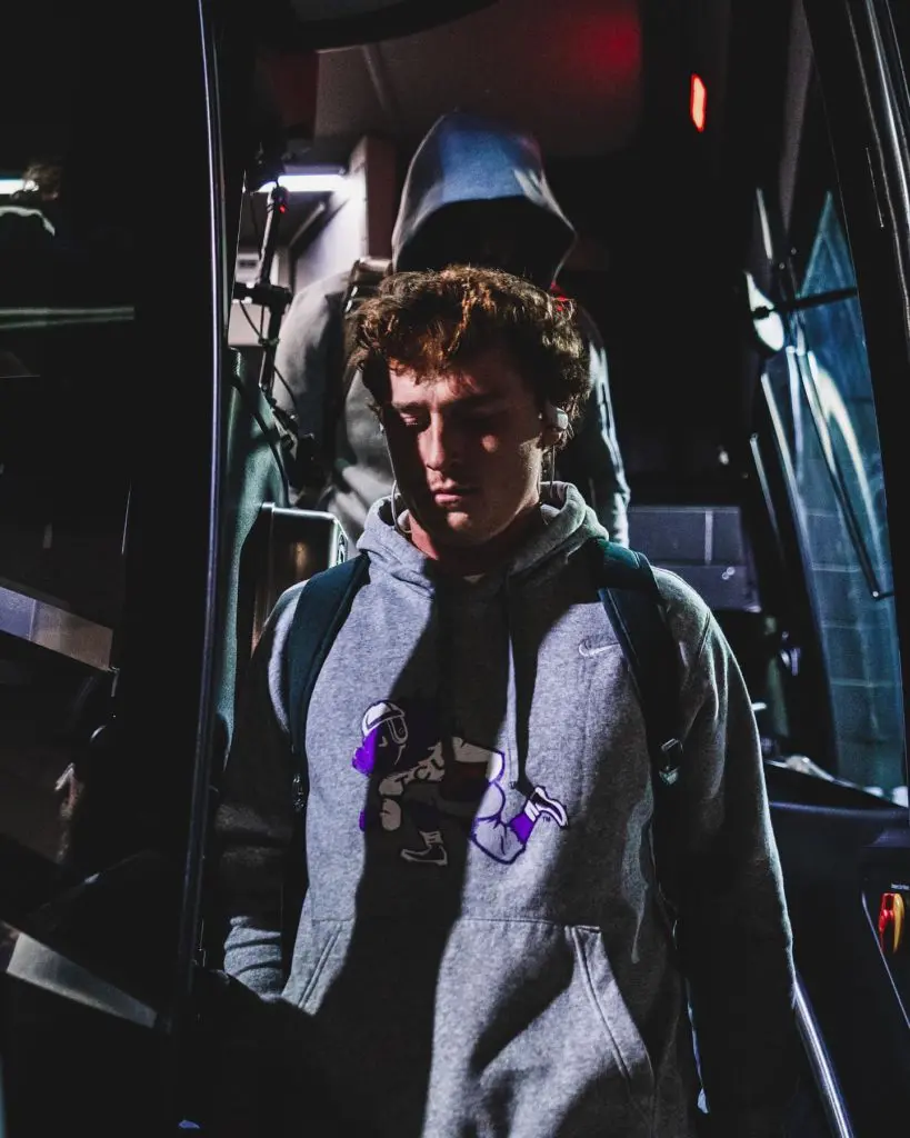 Max Duggan exits the team bus at AT&T Stadium ahead of the Big 12 Championship.