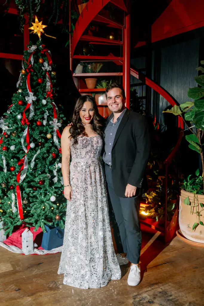 Nancy Almodovar, Remington Bruce at the Nan and Company Properties holiday bash at MAD.  (Photo by Jared Hernandez, Nan Studios)