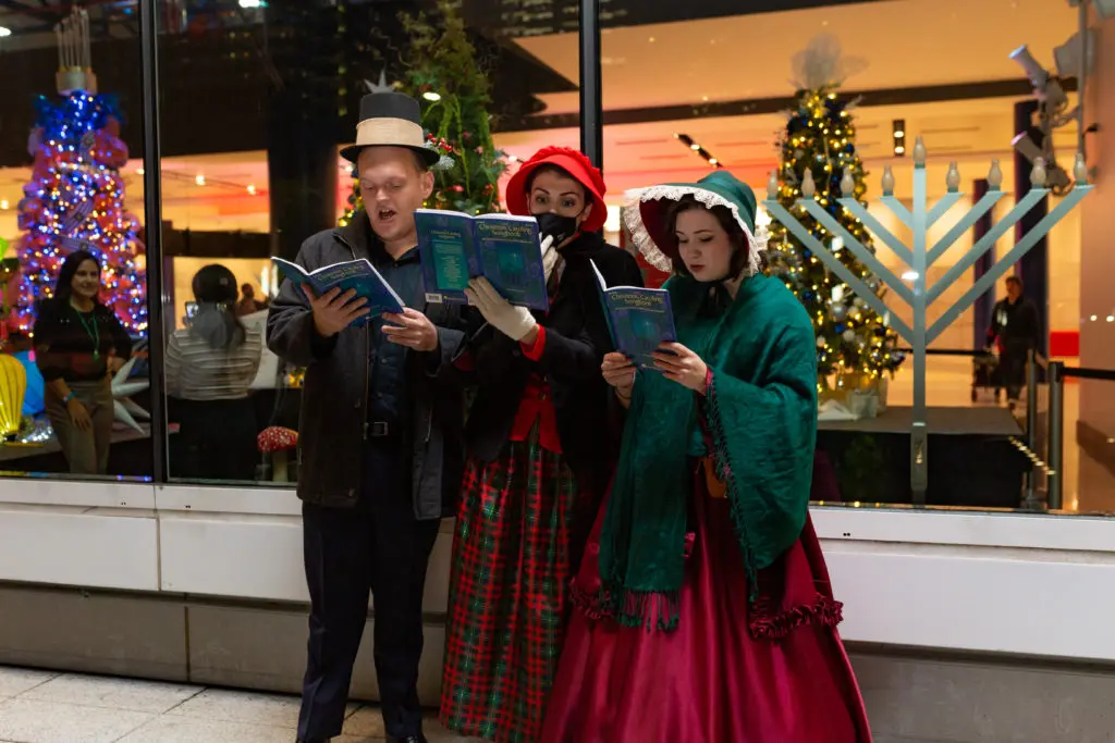 Carolers serenaded guests with Christmas tunes at the opening ceremony for city lights downtown holiday (Courtesy Houston First)