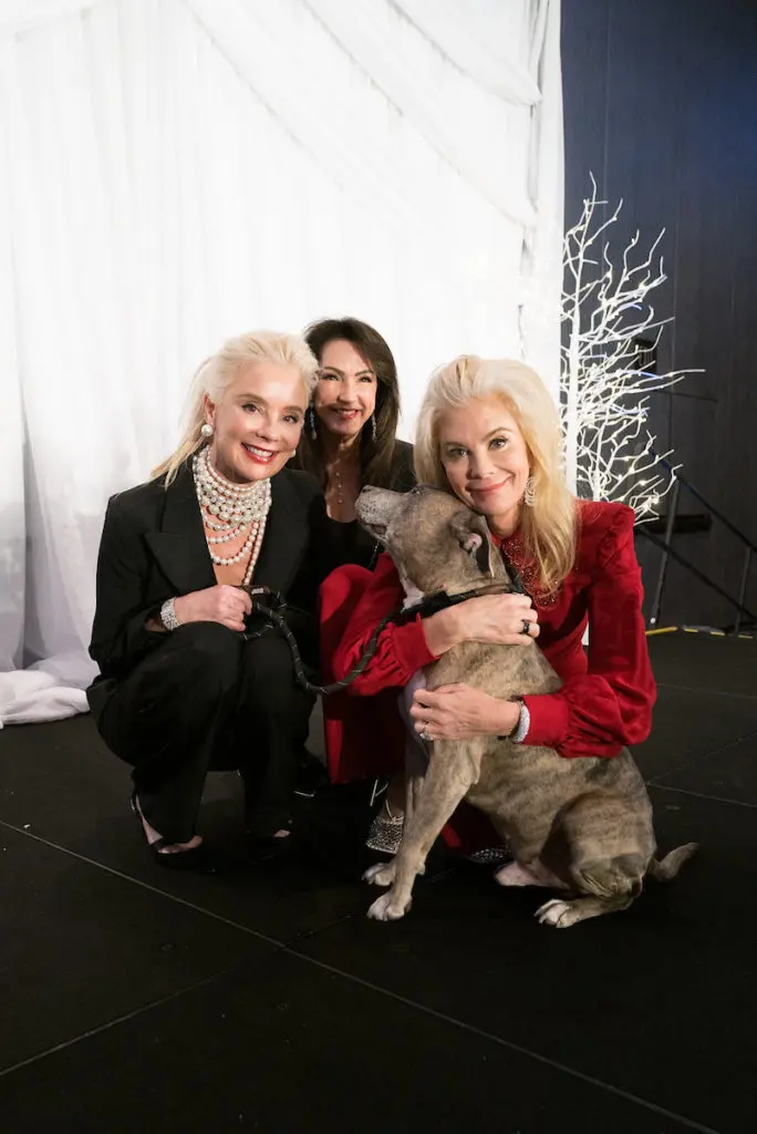 Tena Lundquist Faust, Alicia Smith, Honoree Tama Lundquist with her rescue dog Sonny (Photo by Daniel Ortiz)