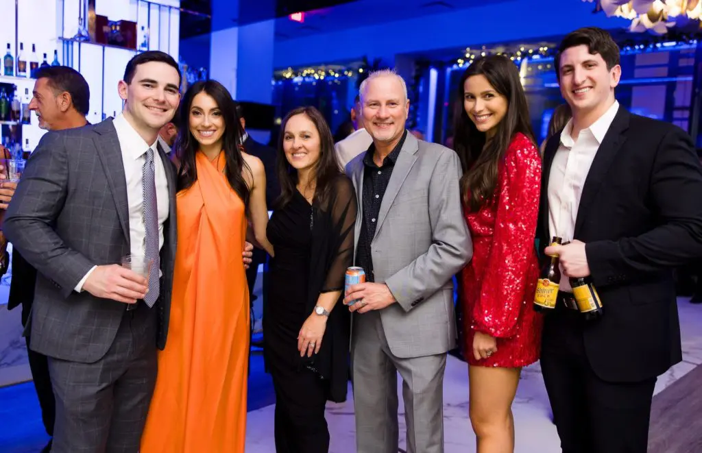 Vinny Aquino, Paige Mullin, Amy Mullin, Pat Mullin, Angie McCartha, Kevin McCartha at Construction Concepts Holiday Party for a Cause (Photo by Hung L. Truong Photography)