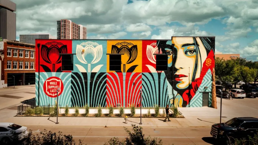 Honoree Shepard Fairey's mural, "While Supplies Last," made a bold statement at the gala entrance. (Photo by Jonathan Zizzo)